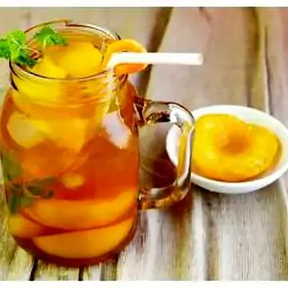 Trà đào - 20.000 ₫ tại Nui Mì Xào Bò & Cơm Bò Lúc Lắc - Lê Quang Định