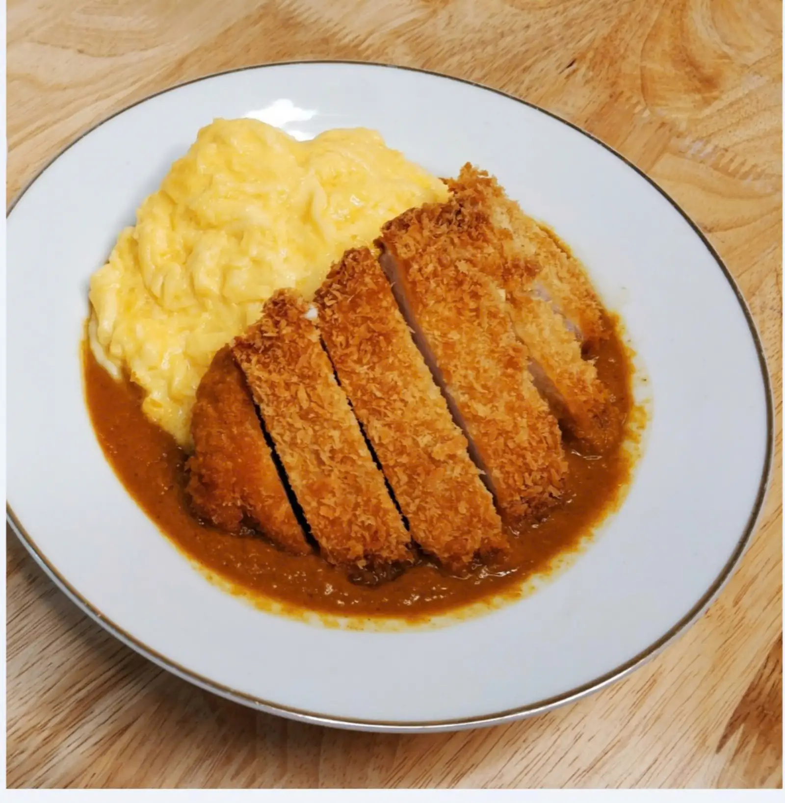 Cơm cà ri trứng Omelette Tonkatsu - 120.000 ₫ tại Chef Gấu - Cơm Cà Ri Vị Nhật