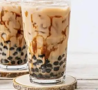 Hồng trà sữa - 50.000 ₫ tại Trà Sữa, Sinh Tố & Bánh Ngọt Dung - Lê Thánh Tôn