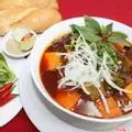 Bánh mì bò kho + Cà ri gà bánh mì + Cháo sườn + Trà chanh mật ong + trà đào  - 168.000 ₫ tại Mai Anh - Bò Kho & Cari Gà - Đường Số 30