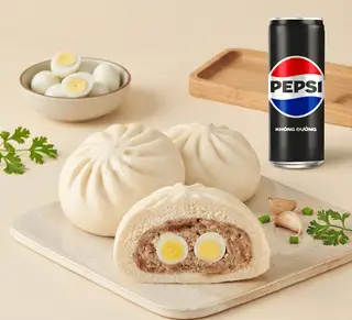 Hình ảnh Bánh bao 2 trứng cút thịt heo + Pepsi không Calo