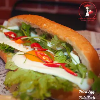 Bánh mì trứng pate - Fried Egg Pate Pork - 35.000 ₫ tại Bánh Mì Út Thương - Coffee & Tea - Tôn Thất Tùng