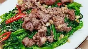Bắp bò xào rau muống - 129.000 ₫ tại Lẩu Bò Hân Quận 5 - Nguyễn Biểu