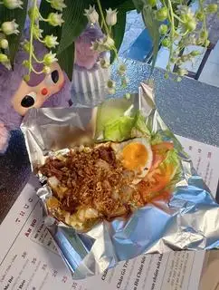 Hình ảnh Nui Bò Sốt Tiêu Đen