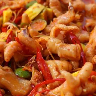 Hình ảnh Chân gà rút xương sốt thái xoài size nhỏ 250gr
