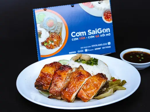 Cơm đùi gà nướng tiêu xanh - 58.000 ₫ tại Cơm Sài Gòn - Cơm Tấm Sườn Bì Chả - Thích Quảng Đức