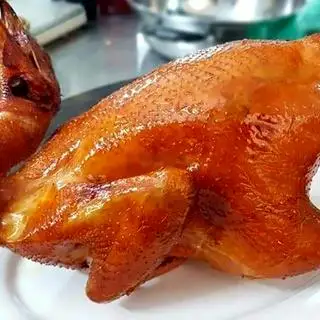 Hình ảnh Gà nướng lu thảo mộc