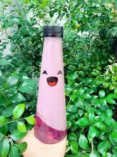 Hình ảnh Trà sữa vị khoai môn chai 330ml