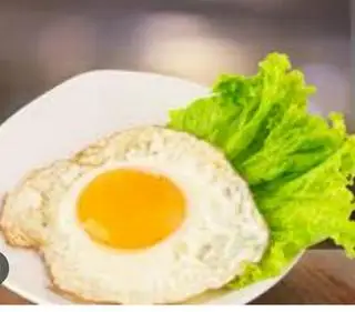 ốp la thêm  - 12.000 ₫ tại Quán Tiger - Cơm Chiên & Mì Xào - Trường Sa