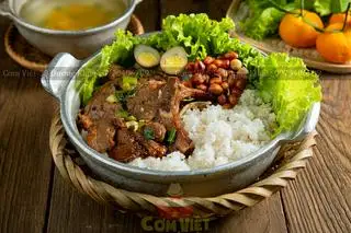 Hình ảnh Cơm Tấm Sườn Cốt Lết Tươi Nướng Củi