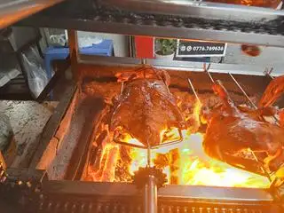 Hình ảnh Vịt nướng lá mắc mật nửa con