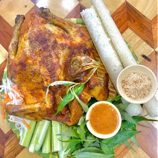 1 Gà ta nướng + 1 cơm + bánh bao - 250.000 ₫ tại Gà Nướng Cơm Lam Hùng Kon Tum - Nguyễn Thượng Hiền