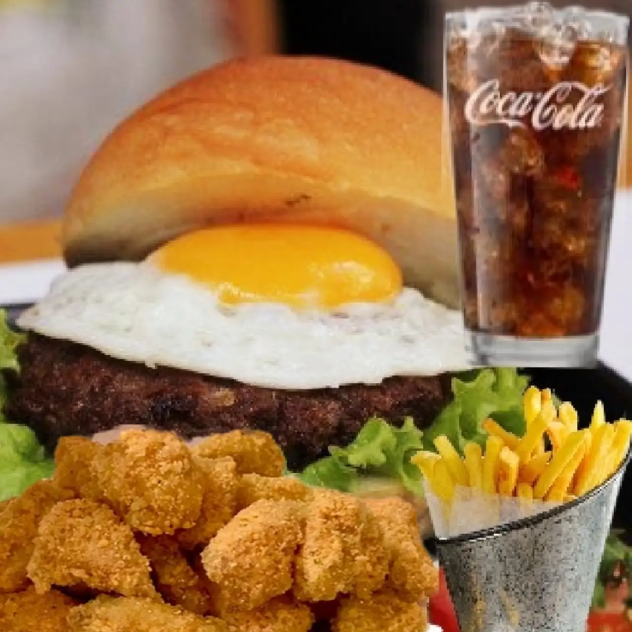 Hình ảnh Combo Hamburger bò trứng + 10 miếng gà viên + khoai + coca