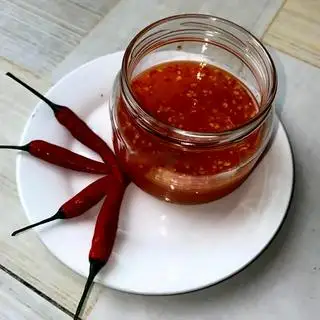 Hủ nước chấm  - 5.000 ₫ tại Quán Chân Gà Pely - Phạm Thế Hiển