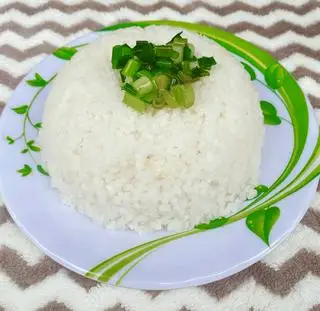 Cơm thêm - 6.000 ₫ tại Cơm Tấm Sao Mai