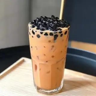 Trà Sữa Thái Đỏ Trân Châu Đen - 20.000 ₫ tại Tiệm Trà Sữa Và Ăn Vặt Hồ Trung - Mang Đi - Phạm Thế Hiển