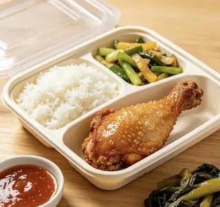 Hình ảnh Cơm đùi gà tỏi chiên giòn sốt mắm tỏi - rau dưa -Tặng 1 phần canh (tuỳ ngày)