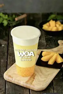 Hồng trà xoài machiato - 30.000 ₫ tại Trà Sữa WOA - BUFFET TOPPING Tự Chọn - Ung Văn Khiêm