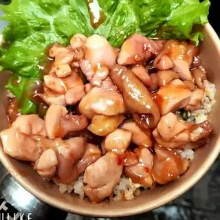 Hình ảnh Cơm đảo đùi gà lọc xương sốt mắm phú quốc