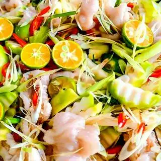 Hình ảnh Chân gà rút xương ngâm sả tắc mix cóc non