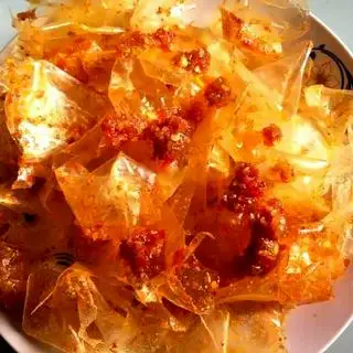 Hình ảnh Bánh tráng dẻo sa tế tỏi muối tắc