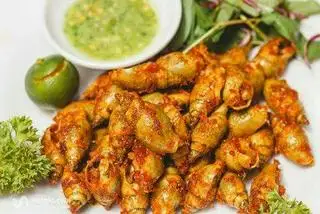 ỐC CÀ NA RANG MUỐI  - 60.000 ₫ tại Quán Milk - Ốc, Lẩu Bò & Lẩu Riêu Cua - Bùi Văn Ba