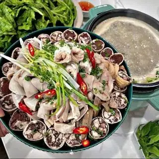 Hình ảnh Lẩu măng lòng 4 người ăn