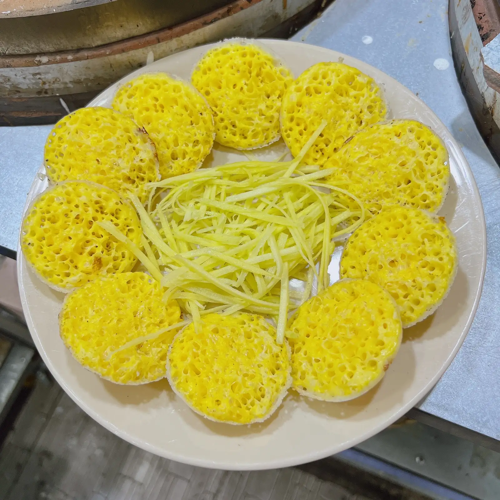 Bánh Căn Trứng Gà (phần 10 cái) - 46.000 ₫ tại Nhà Tròn - Bánh Căn & Xíu Mại Chén Đà Lạt - Đường Số 79