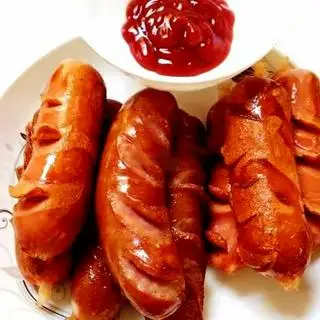 Xúc Xích Đức - 24.000 ₫ tại Mì Cay & Ăn Vặt Lu Na - Đường Số 8