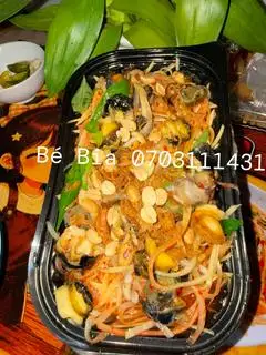 Hình ảnh Gỏi đu đủ ốc bươu