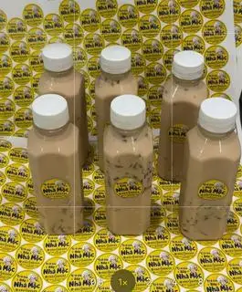 Hình ảnh Trà sữa chai kèm thạch