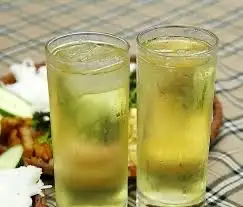 Trà đá - 5.000 ₫ tại Bún Chả Hà Nội Nhà Cát - Trung Mỹ Tây 13
