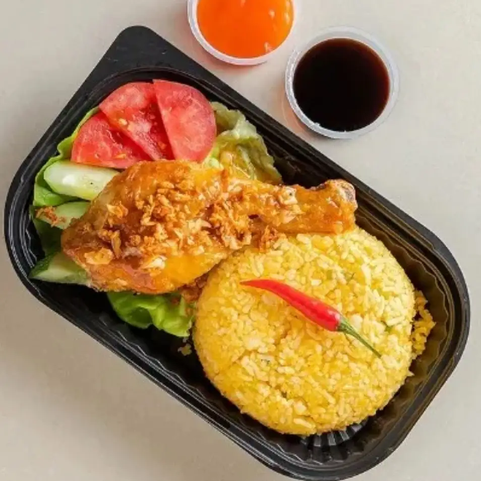 Cơm đùi gà sốt mắm tỏi nhỏ - 48.000 ₫ tại Phú Quý - Cơm Gà Da Giòn - Huỳnh Tấn Phát