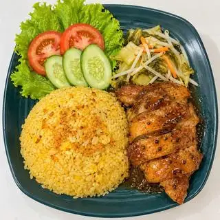 Hình ảnh Cơm má đùi sốt tiêu