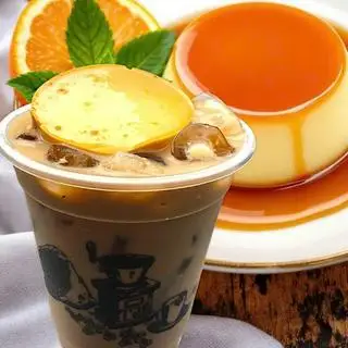 Trà sữa truyền thống bánh flan - 32.000 ₫ tại Bánh Tráng Tỏi Ớt Cô Giang - Chung Cư Trần Quang Diệu