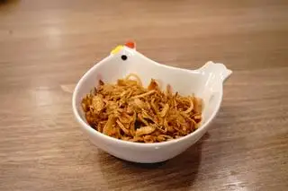 Hành phi - 10.000 ₫ tại Bánh Cuốn Nóng 66 - Bùi Đình Tuý
