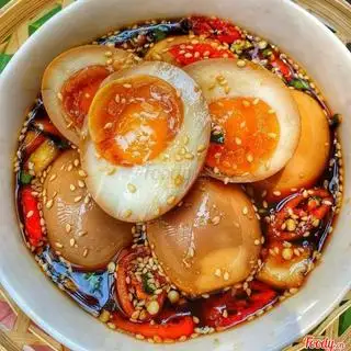 Hình ảnh Trứng lòng đào ngâm tương