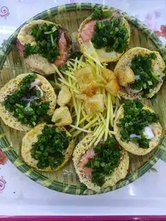 Bánh Căn Tôm Mực Đặc Biệt - 165.000 ₫ tại Bánh Căn & Bánh Xèo Cao Phong - Đặc Sản Phan Rang - Lê Văn Sỹ