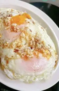 Hình ảnh Cơm trứng ốp la 2trứng +gỏi chua