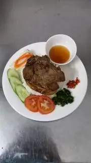 Cơm tấm sườn - 60.000 ₫ tại Cơm Tấm & Bò Kho Cô Oanh - Phạm Hùng