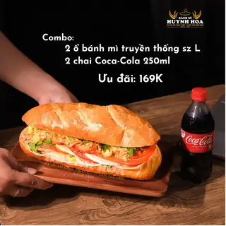 Hình ảnh 2 ổ bánh mì tt sz L + 1 chai Coca-Cola 250ml. Tặng 1 chai Coca-Cola 250ml