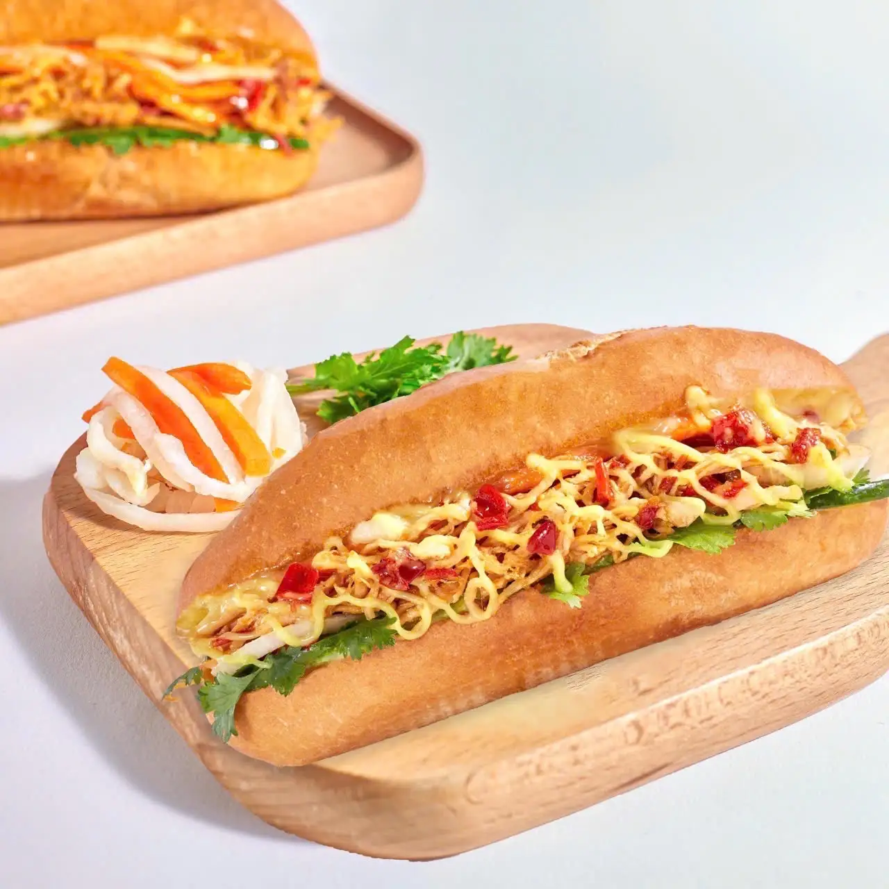 Bánh mì gà rim xé - 56.000 ₫ tại Bánh Mì Chim Chạy - Nguyễn Thị Minh Khai