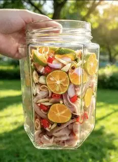 Hình ảnh  Lổ Tai heo ngâm sả tắc