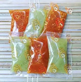 2 Gói nước chấm cay & Không cay - 7.000 ₫ tại Hệ Thống Gà Quay Ngọc Minh Food - Bánh Bao & Cơm Lam - Phan Văn Trị