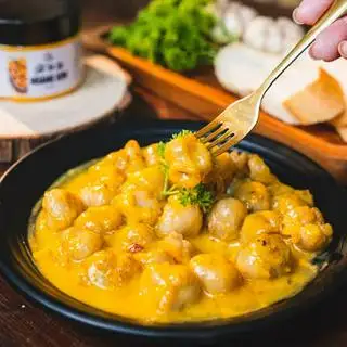Hình ảnh Răng mực xào bơ bắp