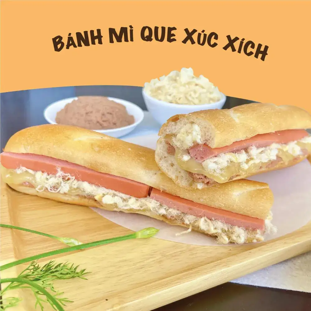 Bánh Mì Que Xúc Xích - 24.000 ₫ tại Bánh Mì Que - Bay Baguette - Hoàng Văn Thụ