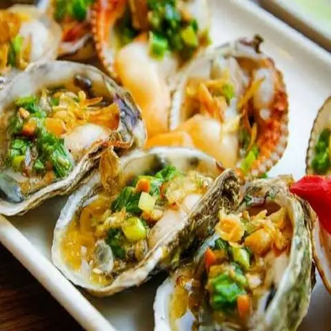 Hình ảnh Hàu Sữa Nướng, Dừa Ly & Nước Ngọt Các Loại - Gò Ô Môi