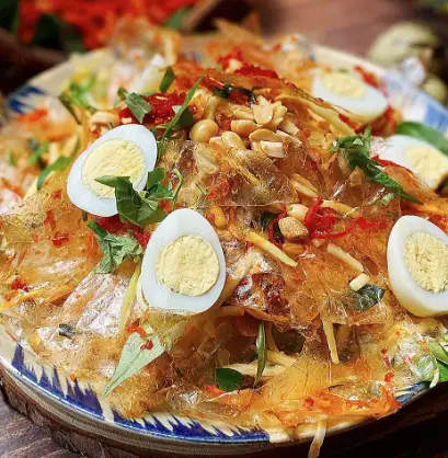 Bánh tráng trộn full topping  - 30.000 ₫ tại Ăn Vặt Win79 - Bánh Tráng Trộn, Da Heo Trộn & Gỏi Cuốn Tôm Trứng Thịt - Hương Lộ 2
