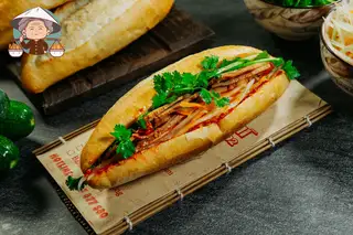 Bánh mì xá xíu - 32.000 ₫ tại Bánh Mì Quảng Nam 92 - Nguyễn Thị Minh Khai