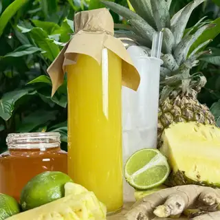 Nước ép dứa gừng mix - chai thủy tinh - 69.000 ₫ tại Ginger Root - Nước Ép Lạnh, Bữa Ăn Protein & Shot Gừng - Sky Garden